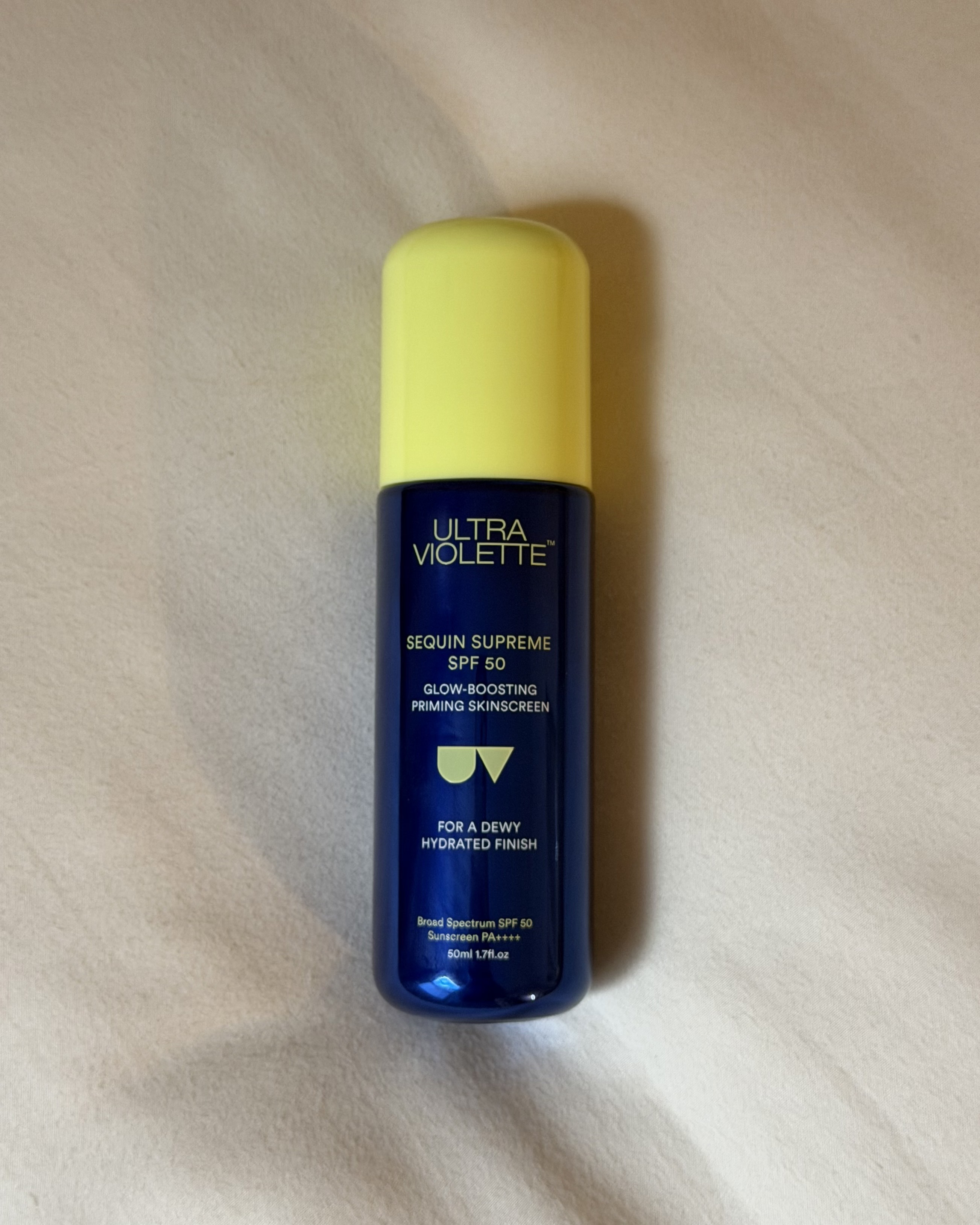 A bottle of Ultra Violette Sequin Supreme Sunscreen.