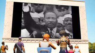 Fortnite characters lined up watching MLK projected onto a screen ingame.