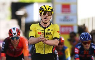 Matthew Brennan (Visma-Lease A Bike) celebrates victory on stage 1 of the Tour de Romandie