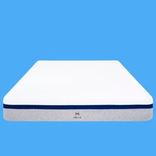 The Helix Midnight is the best mattress for side sleepers and is shown here with a grey base and white cover separated by a black band of material