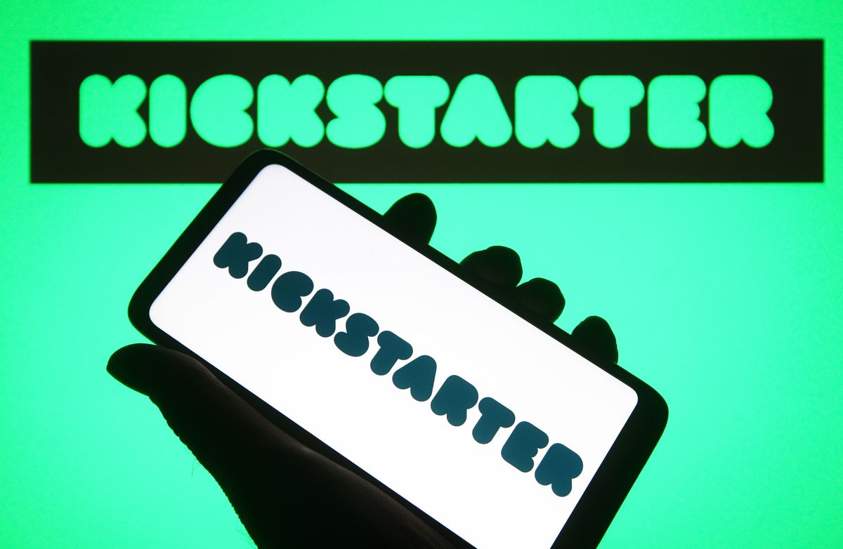 In this photo illustration, a Kickstarter, PBC logo is seen on a smartphone and on the background.