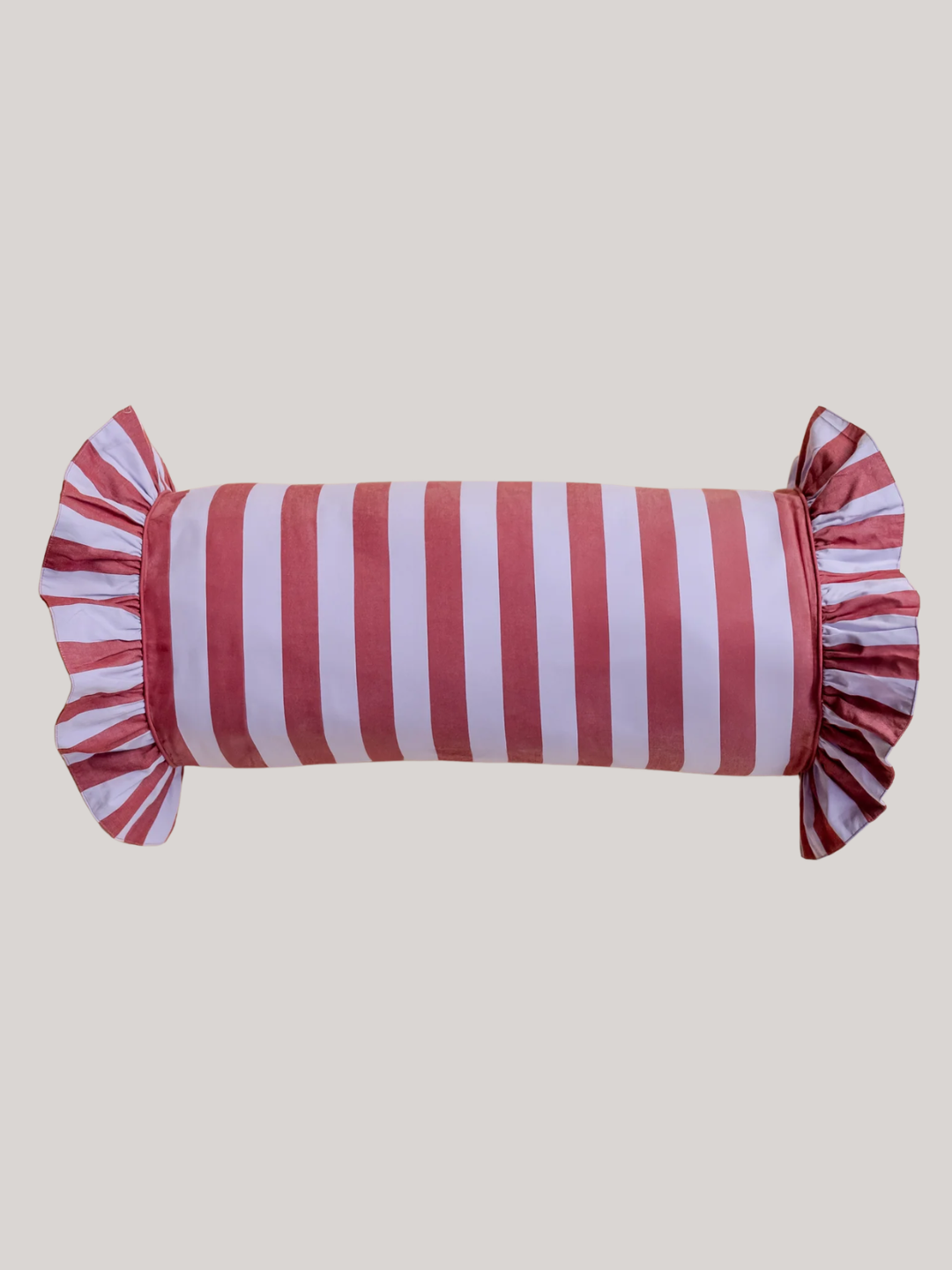 A striped purple and burgundy bolster cushion