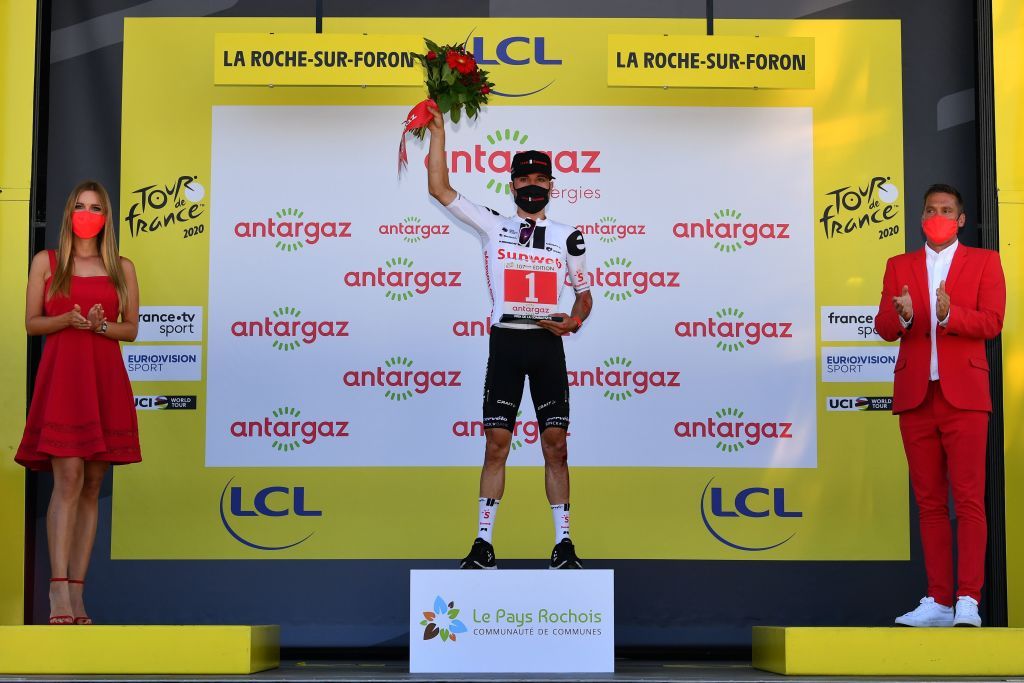 Team Sunweb rider Switzerlands Marc Hirschi celebrates his combativity prize at the end of the 18th stage of the 107th edition of the Tour de France cycling race 168 km between Meribel and La Roche sur Foron on September 17 2020 Photo by Stuart Franklin various sources AFP Photo by STUART FRANKLINAFP via Getty Images