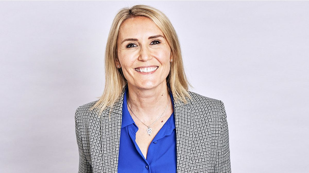 Zyxel&#039;s Rachel Rothwell, a headshot of her smiling set against a light pink background