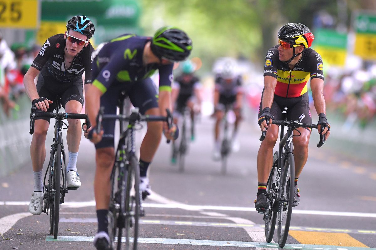 Philippe Gilbert (Quick-Step Floors) looks over at Tao Geoghegan Hart of Team Sky