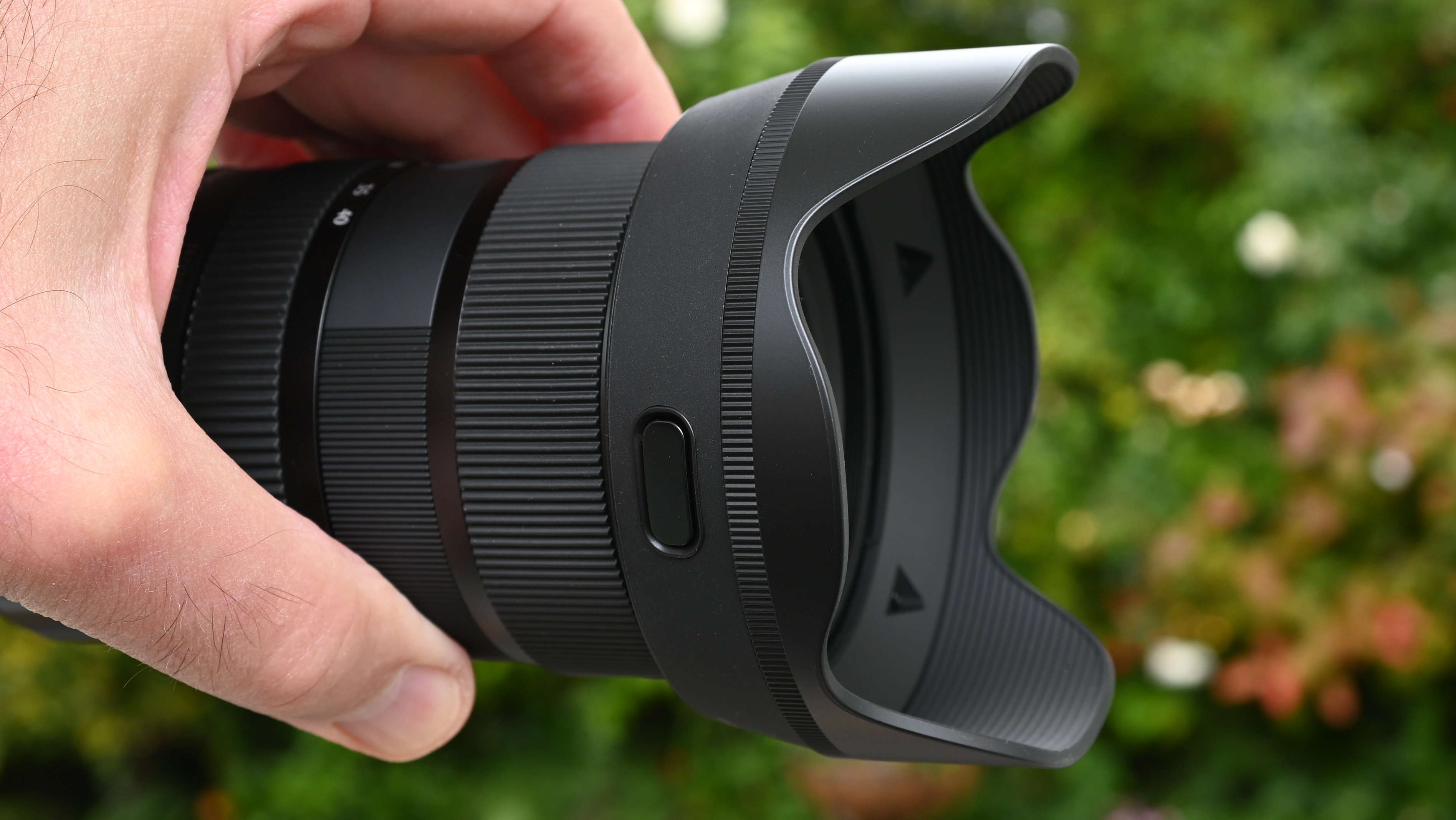 Sigma 17-40mm f/1.8 DC | A product shot held in hand