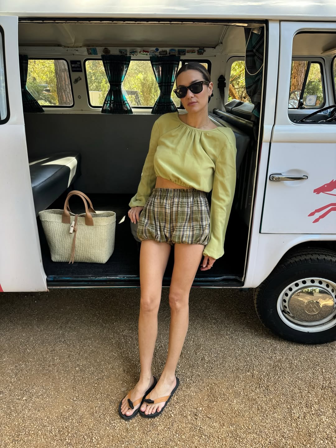 Anne-Laure wearing shorts and flip flops