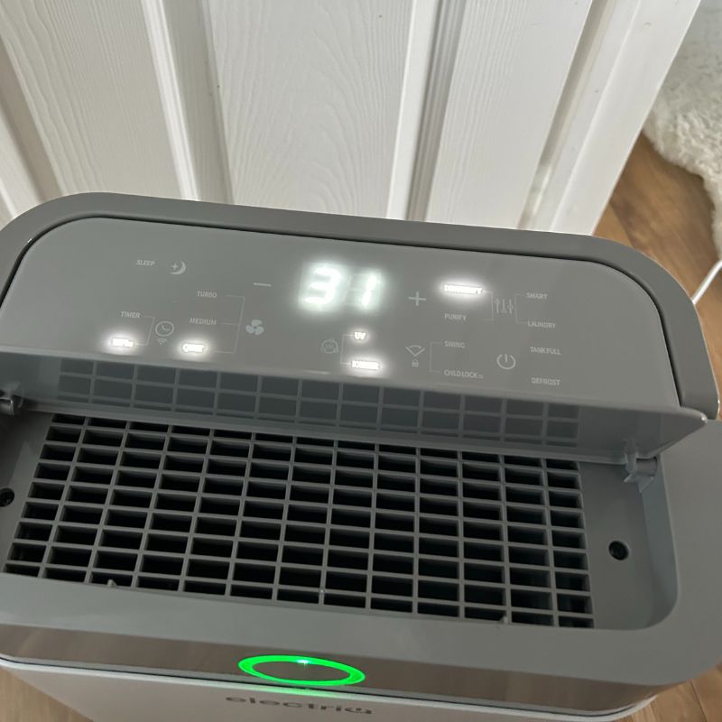ElectricQ dehumidifier control panel showing 31 with green light