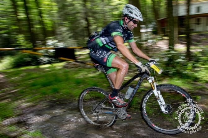Drew Edsall hits a muddy section along Wert Path in Stage 6