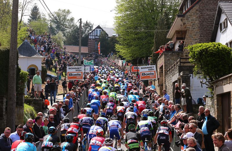 The peloton rides up the Mur de Huy
