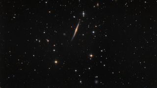 Galaxy NGC 5529 (FGC 1735) is located in the northern sky constellation Boötes (the Herdsman), approximately 140 million light-years from Earth. Bob Franke captured this image from the Focal Pointe Observatory in Chino Valley, Ariz., from April 3 to May 17, 2013.