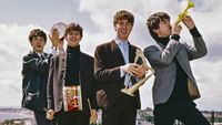 The Beatles pose for a portrait on the roof of the Palace Court Hotel in Bournemouth during their six night residency at the Gaumont Theatre, August 1963. (L-R) George Harrison, John Lennon, Ringo Starr, Paul McCartney. 