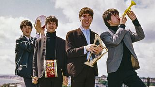 The Beatles pose for a portrait on the roof of the Palace Court Hotel in Bournemouth during their six night residency at the Gaumont Theatre, August 1963. (L-R) George Harrison, John Lennon, Ringo Starr, Paul McCartney.