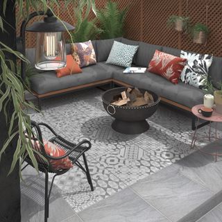 patterned outdoor tiles in small patio area with outdoor seating