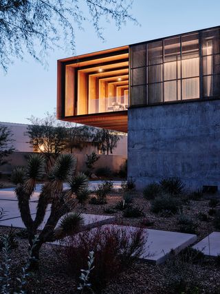 red rock house exterior detail of cantilevered volume