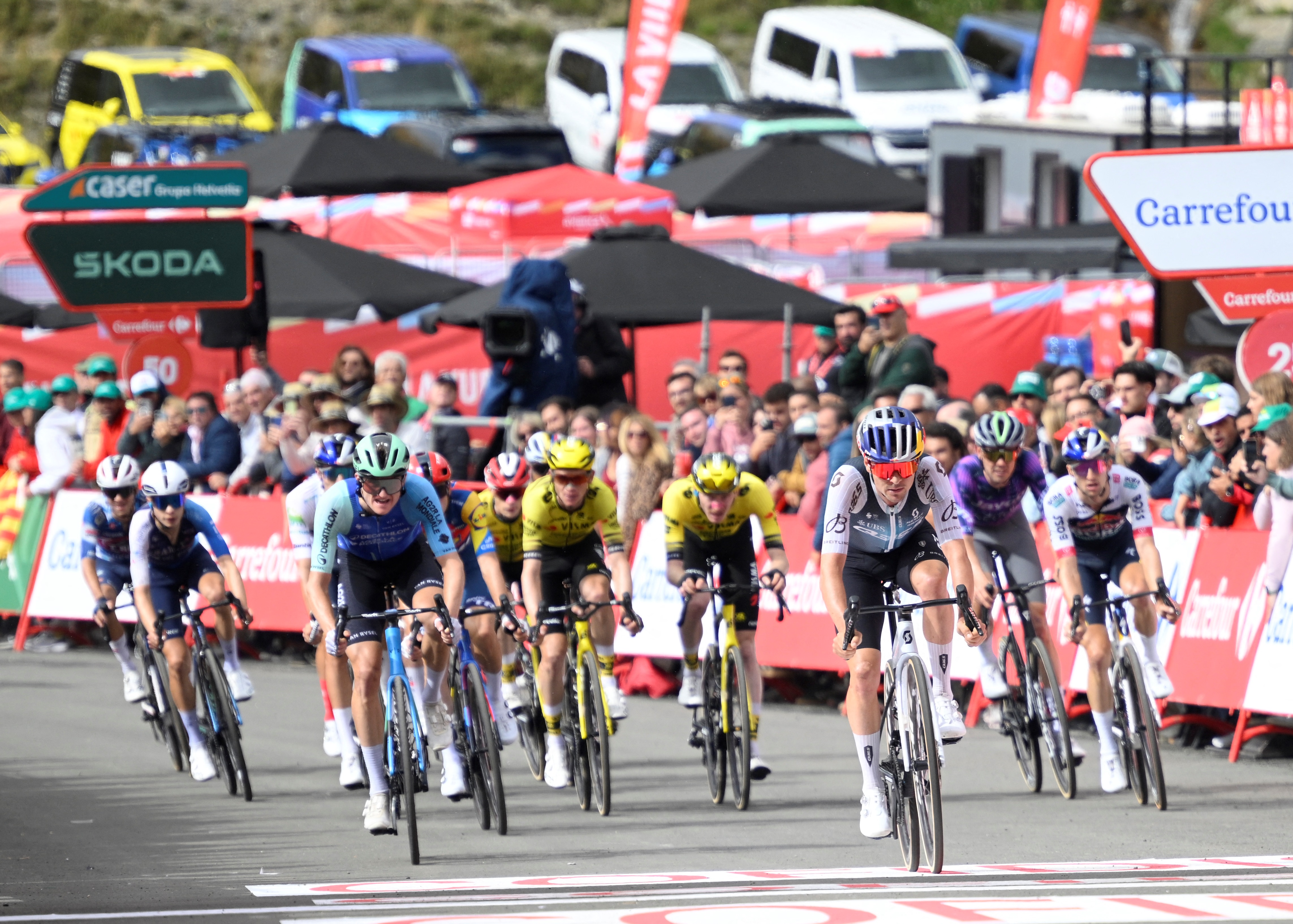 The GC favourites cycle across the finish line on stage seven of the 2025 Vuelta a España