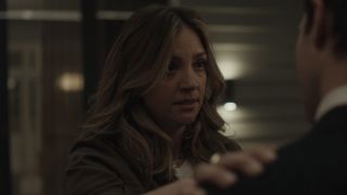 Lia with her arm on Peter's shoulder in the first episode of All Her Fault