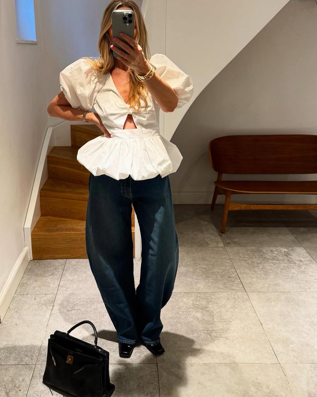 woman wearing jeans and a cute top