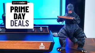 GamesRadar+ Prime Day deals badge next to Atari 2600+ and Godzilla figure holding tiny Atari on right.