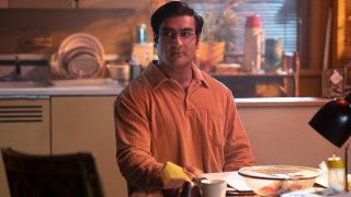 Kumail Nanjiani sits at his kitchen table in Welcome To Chippendales.