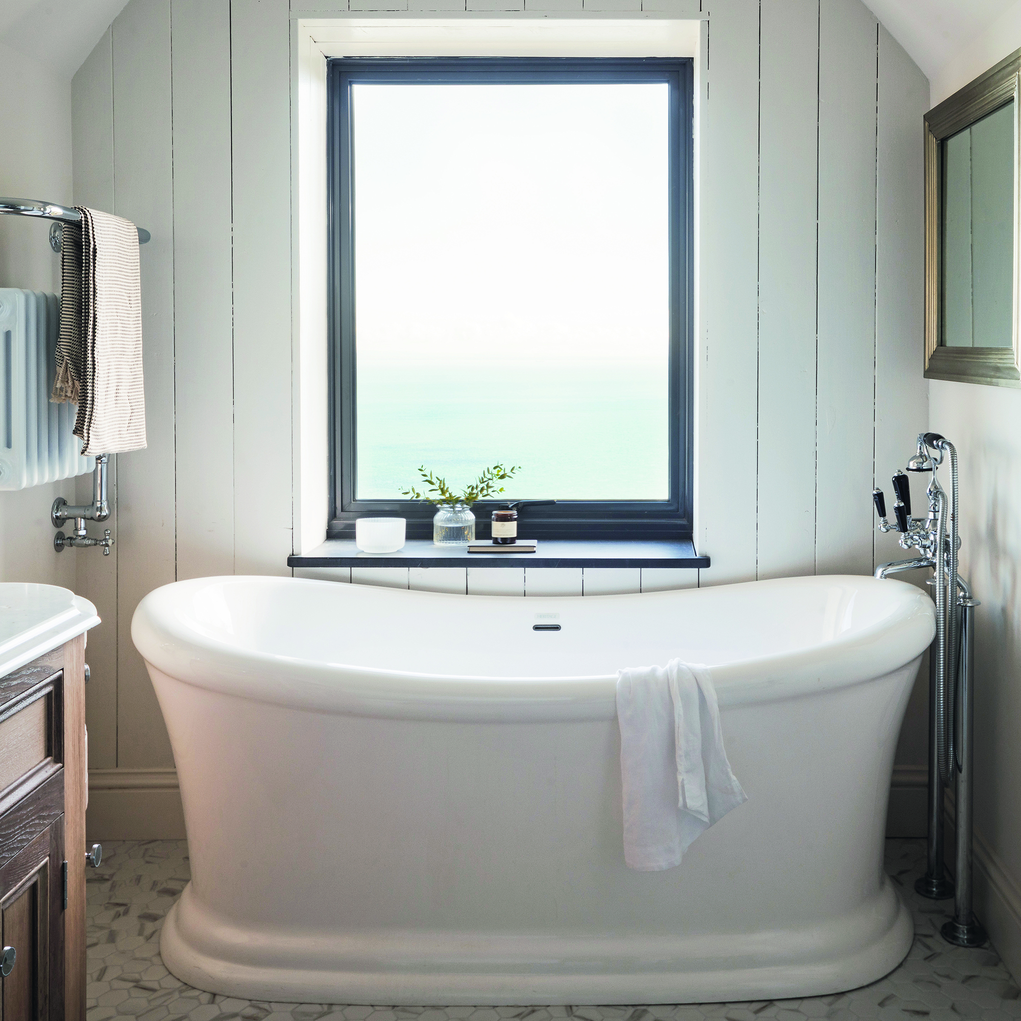 Coastal bathroom with sea view from window