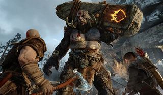 Kratos and son fight a troll in god of war
