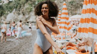 woman in swimsuit on beach