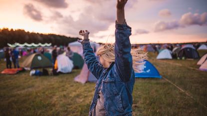 best festival tents: woman dancing at a festival