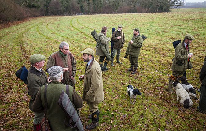 Men in tweed shooting coats