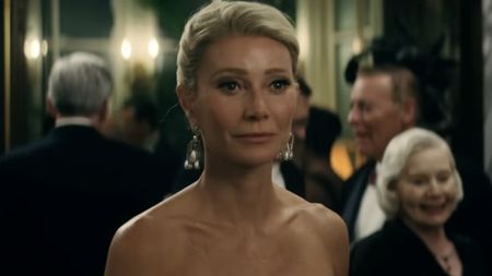 Kay Stone (Gwyneth Paltrow) looks on in Marty Supreme.