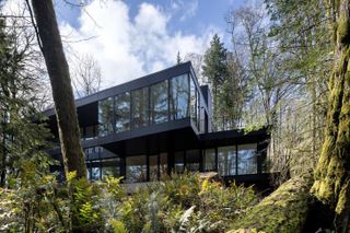 Black house exterior and glass windows