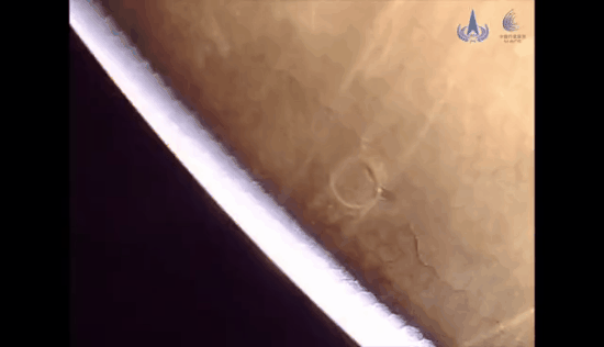This brief time-lapse captures the moment of separation as China's Zhurong rover and lander cast off from the Tianwen 1 orbiter to descend to Mars.