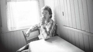 Brice Springsteen seated at a kitchen table