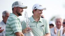 Alex and Matt Fitzpatrick with the Zurich Classic trophy