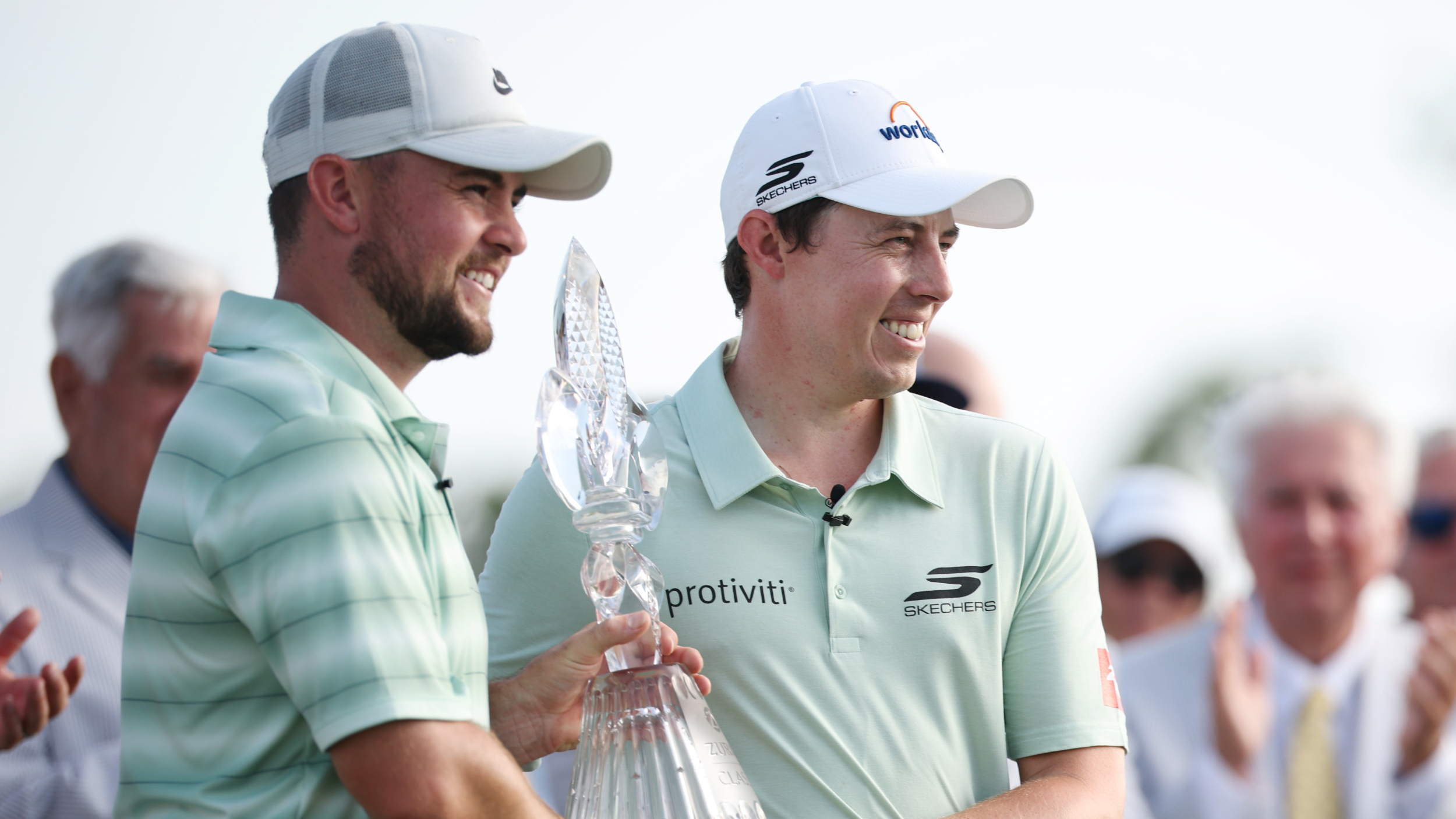 Alex and Matt Fitzpatrick with the Zurich Classic trophy