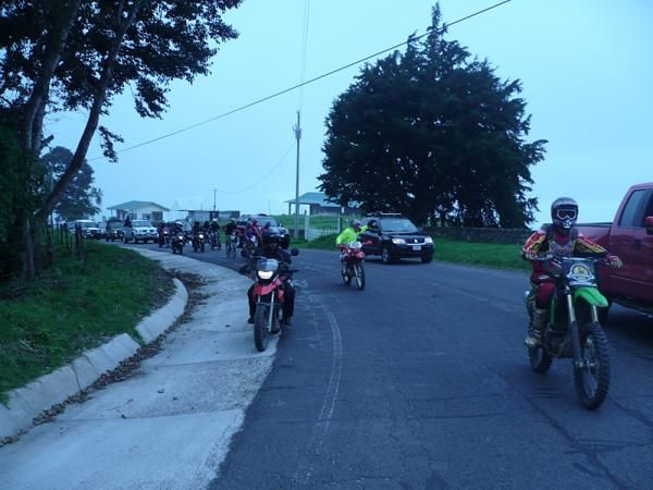 The leaders were followed by a chaotic motorcade with horns blaring and cars passing other cars in the ditch