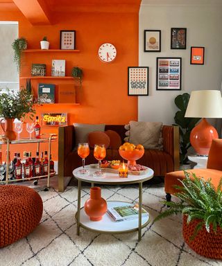 Aperol A Casa Capsule, orange interior collection by Aperol, living room designed by Italian liquor manufacturer