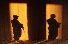 Shadows of Hamas security forces.