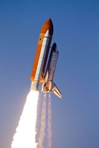 Space shuttle Discovery hurtles upwards at an amazing 17,500 miles per hour, embarking on the STS-133 mission to the International Space Station. Liftoff from launch Pad 39A at NASA's Kennedy Space Center in Florida occurred on Feb. 24, 2011.