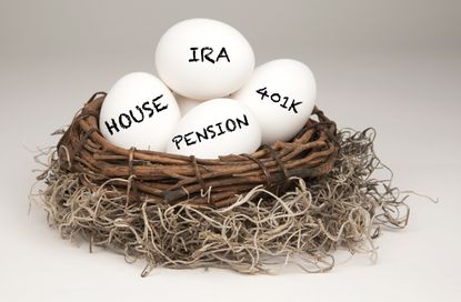 White eggs in a brown nest labelled with IRA, Pension, 401k and House representing a typical nest egg.