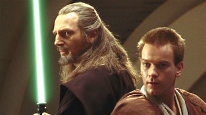 Qui-Gon Jinn (Liam Neeson) and Obi-Wan Kenobi (Ewan MacGregor) prepare for a lightsaber duel in Star Wars - Episode I: The Phantom Menace