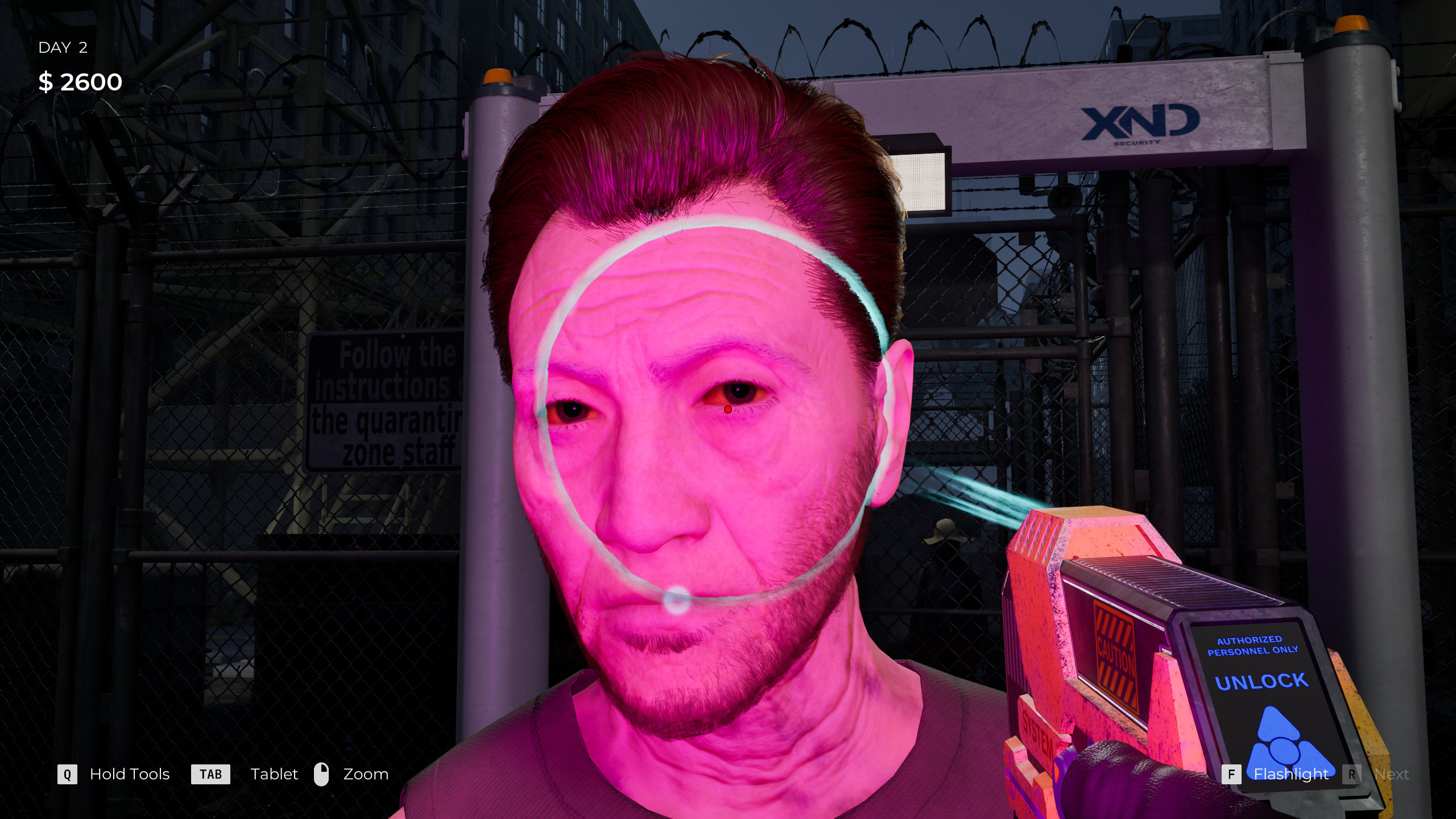A person being scanned with UV light