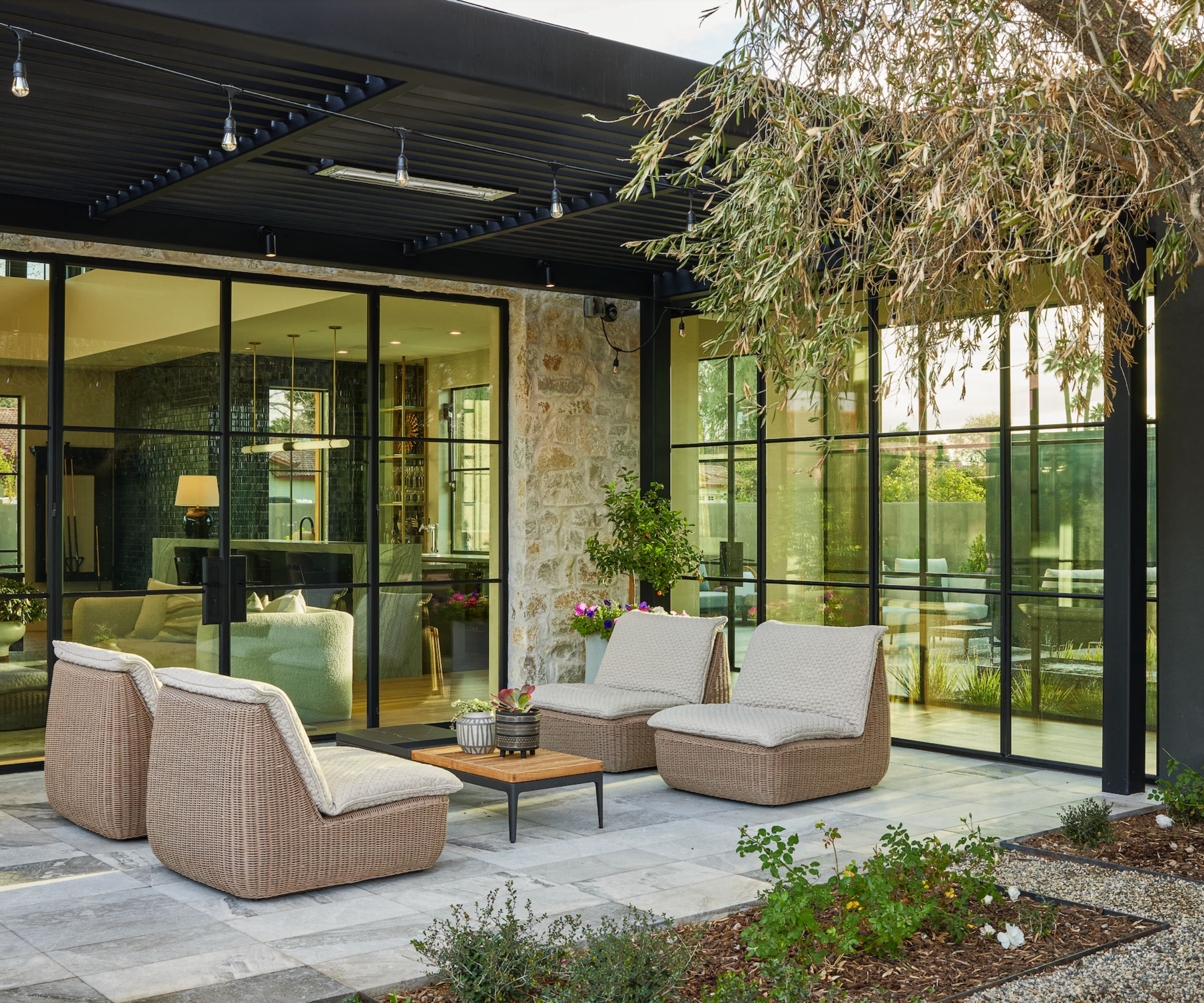 Outdoor living area with glass screen