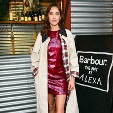 Alexa Chung wears a country coat.