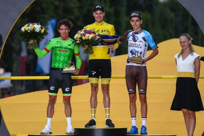 Tour de France winner Chris Froome flanked by runner-up Rigoberto Ur&aacute;n and third-placed Romain Bardet