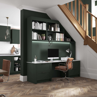 home office with stairs and wooden flooring