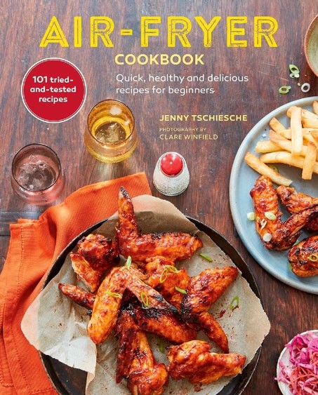Cover of the &#039;Air-Fryer Cookbook&#039; featuring crispy chicken wings on a platter, highlighting quick and healthy recipes for beginners.