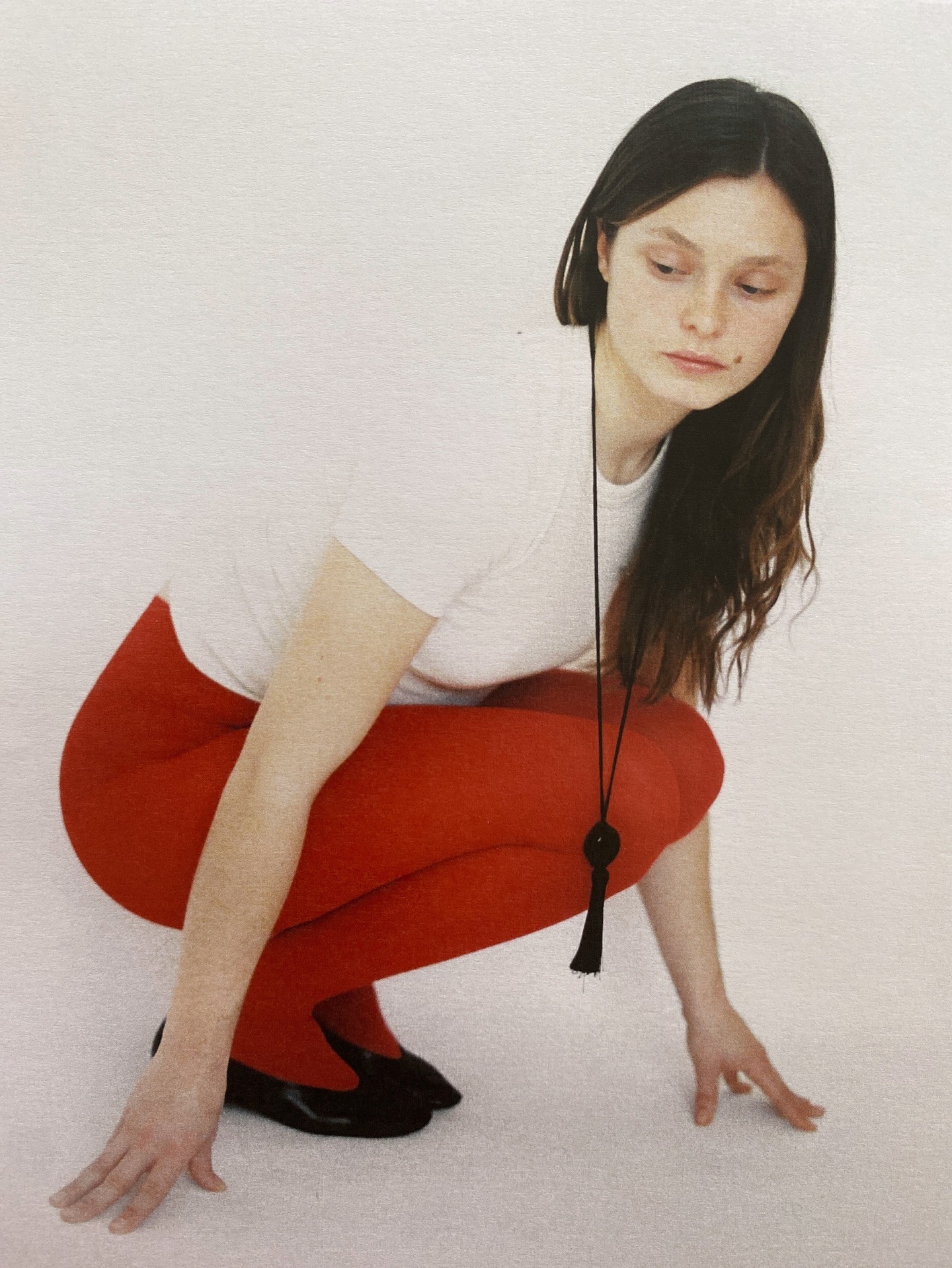 Photo of model wearing stone Casa Ayllon necklace.