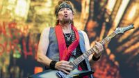 Adrian Smith of Iron Maiden performs at London Stadium on June 28, 2025 in London, England