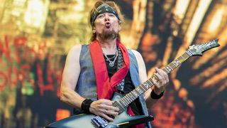 Adrian Smith of Iron Maiden performs at London Stadium on June 28, 2025 in London, England